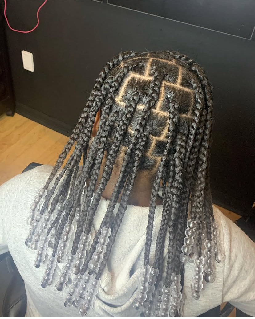 Knotless braids finished with clear beads